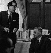 Professor Koji Shirai (left) and Sartre (right) in the Old University Library