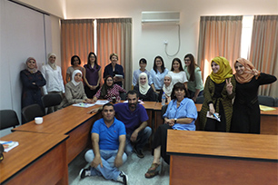 With her professor and classmates of Birzeit University in Palestine