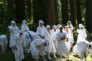 Students take a break during a walking trip to experience being a mountain priest at Mt. Haguro