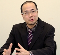 Eisaku Ide, Associate Professor, Faculty of Economics