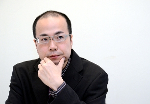 Eisaku Ide, Associate Professor, Faculty of Economics