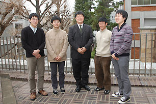 With Students who Participated in the Nyukawa Fieldwork (From left: second-year Kousuke Matsumoto, Faculty of Law; second-year Yuichiro Watanabe, Faculty of Economics; fourth-year Sachio Okuno, Faculty of Economics; fourth-year Satoshi Kato, Faculty of Economics) (As of March 2012)